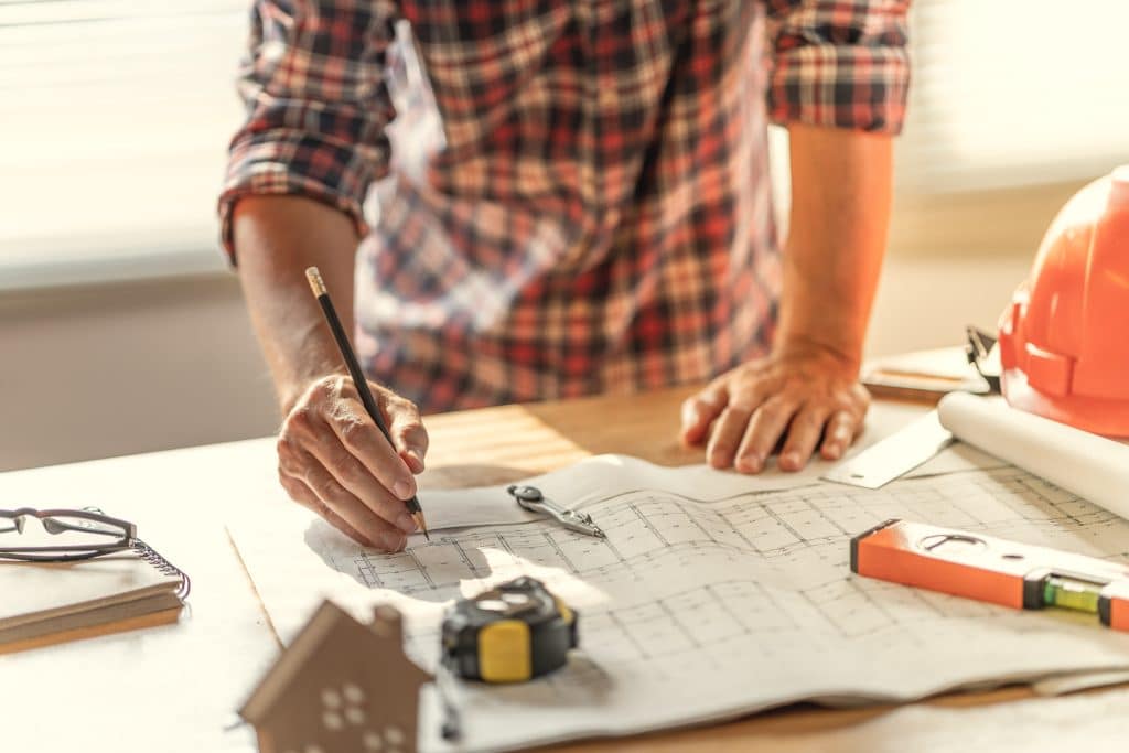 Architects designing building plans